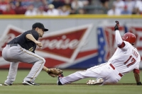 Reds' 4 homers overpower Pirates, 4-1